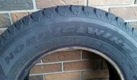 Set of four 195/70/R14 Good Year Nordic Winter tires.