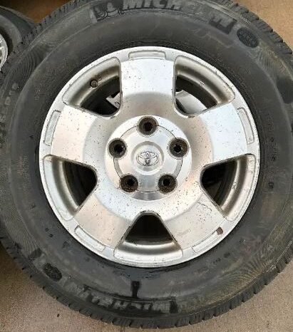 
								Toyota Tundra rims with Michelin LTX winter tires full									