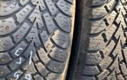 Two Goodyear Nordic 195/65R15 winter tires
