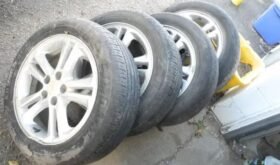 Cheve Cruse Aluminum set of 4 Tires and Rims all season