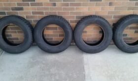 Set of four 195/70/R14 Good Year Nordic Winter tires.