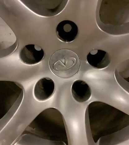 
								18″ Infiniti rims with tires full									
