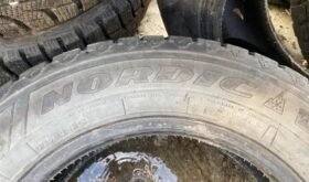Two Goodyear Nordic 195/65R15 winter tires