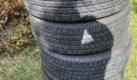 Four Goodyear Wrangler Fortitude 265/70R17 tires