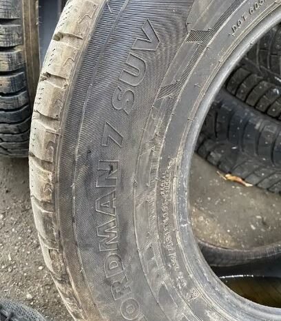 
								Three Nokian 235/70R16 winter tirestires full									