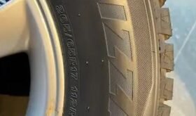 Set of 4 almost new Blizzak tires and factory Lexus wheels
