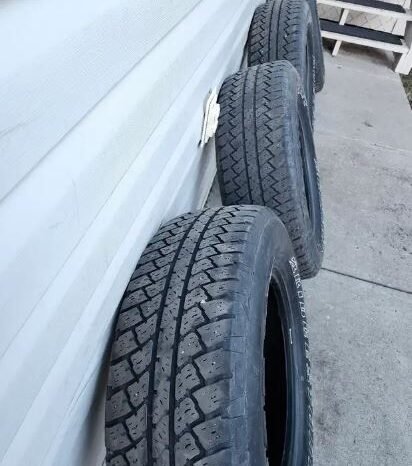 
								4 Bridgestone Dueler A/T 225/70R18 All Weather Tires full									