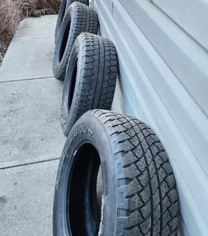 
								4 Bridgestone Dueler A/T 225/70R18 All Weather Tires full									