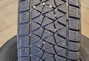 
										225 70 16, Bridgestone winter tires, 80% tread remaining full									