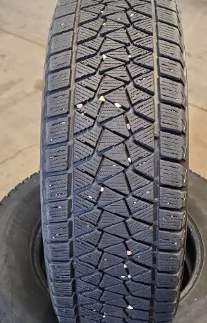 
								225 70 16, Bridgestone winter tires, 80% tread remaining full									
