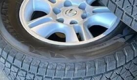 Set of 4 almost new Blizzak tires and factory Lexus wheels