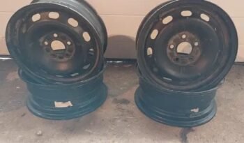 
										Four 5 bolt 15 in rims full									