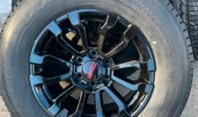 New 1995-2024 GMC Sierra AT4x black rims N Firestone Winter tire
