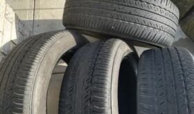 A set of 4 Bridgestone All season tires 245 55 19