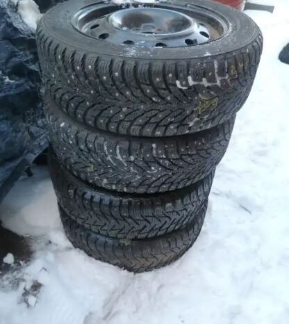 
								4 205/55 R 16 Winter tire Studded on steel rims full									
