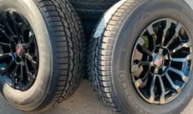 New 1995-2024 GMC Sierra AT4x black rims N Firestone Winter tire