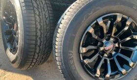 New 1995-2024 GMC Sierra AT4x black rims N Firestone Winter tire